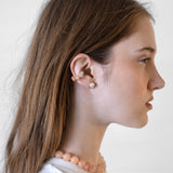 Alba, Ear cuff
