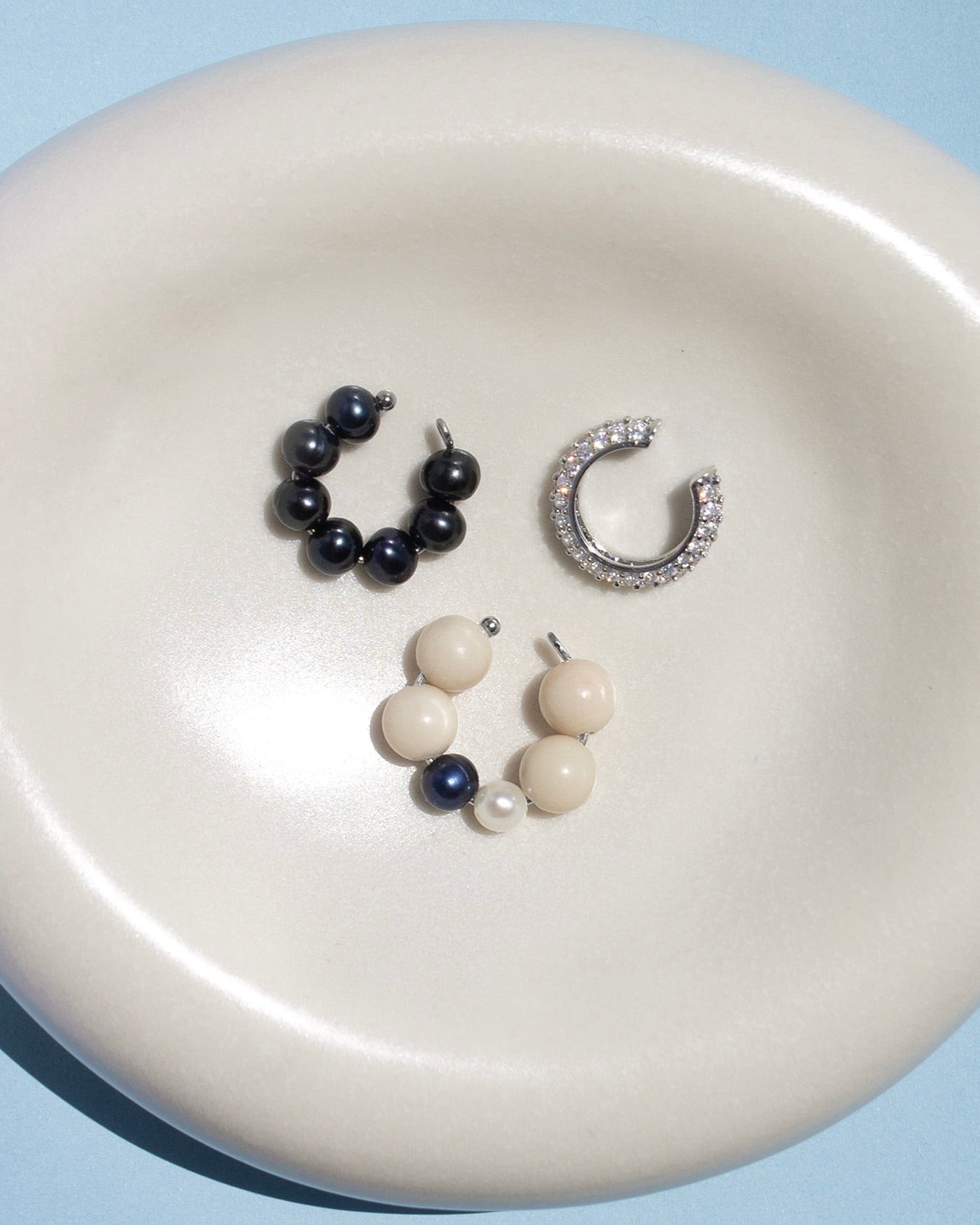 Tris Litorale, Set ear cuff